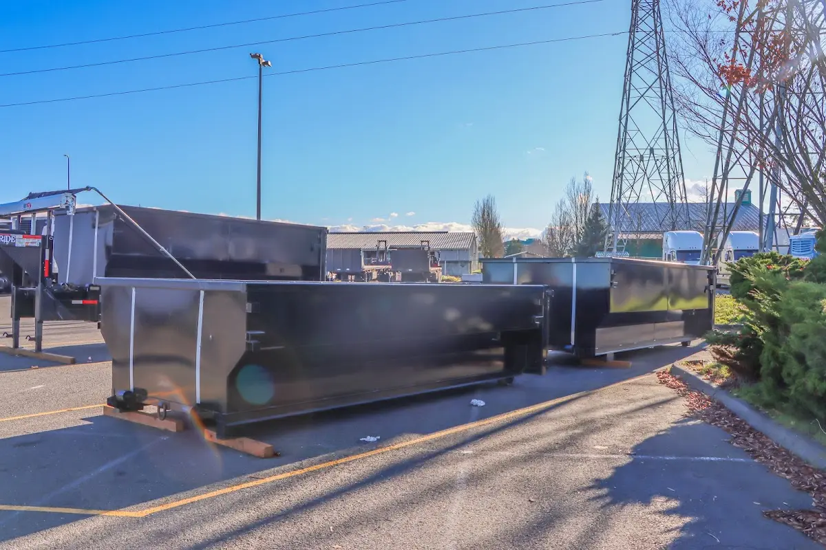 Roll-off dumpster ready for waste disposal at job site for 2 Yard Dumpster Rental in Tega Cay